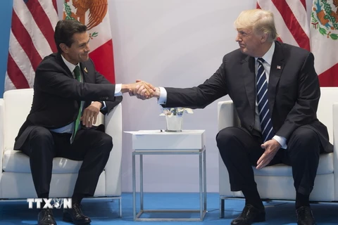 Tổng thống Mexico Enrique Pena Nieto (trái) và Tổng thống Mỹ Donald Trump. (Nguồn: AFP/TTXVN)