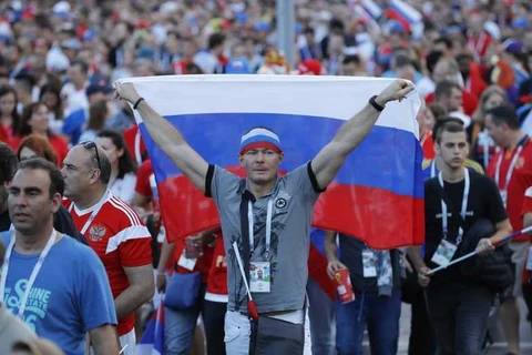 Niềm vui của các cổ động viên Nga sau khi thắng Tây Ban Nha. (Nguồn: SCMP)