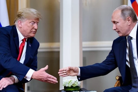 Lãnh đạo hai nước Mỹ và Nga gửi thông điệp hợp tác. (Nguồn: AFP)