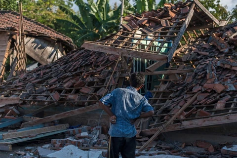 Những mảnh đời cơ cực sau thảm họa động đất tại Indonesia. (Nguồn: The Independent)