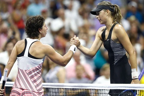 Maria Sharapova ''tặng'' quà sinh nhật cho đối thủ tại US Open. (Nguồn: DNA India)