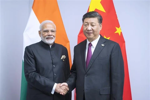 Thủ tướng Ấn Độ Narendra Modi (trái) và Chủ tịch Trung Quốc Tập Cận Bình (phải) tại cuộc gặp bên lề Hội nghị G20 ở Buenos Aires, Argentina, ngày 30/11/2018. (Nguồn: THX/TTXVN)