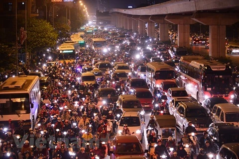 Hà Nội sẽ thu phí phương tiện vào nội đô để giảm ùn tắc giao thông và ô nhiễm môi trường. (Ảnh: PV/Vietnam+)