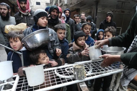 Người dân Syria đang phải chống chọi với điều kiện sống khó khăn. (Nguồn: The Express Tribune)