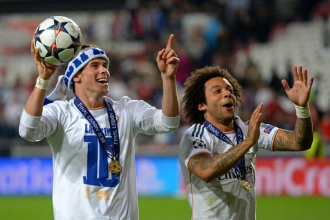 Hóa ra từ trước đến giờ Bale (trái) và Marcelo chỉ hiểu nhau bằng cách ra hiệu. (Nguồn: Zimbio)