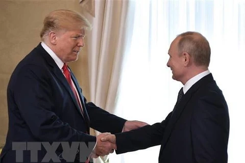 Tổng thống Mỹ Donald Trump (thứ 2, trái) và người đồng cấp Nga Vladimir Putin (phải) trong cuộc gặp thượng đỉnh tại Helsinki, Phần Lan ngày 16/7/2018. (Nguồn: AFP/TTXVN)​