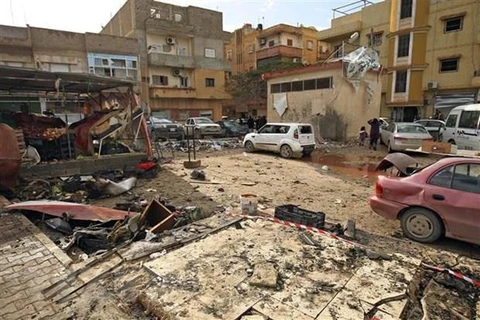 Hiện trường một vụ tấn công tại Benghazi, Libya. (Nguồn: AFP/TTXVN)