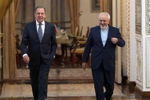 Ngoại trưởng Nga Sergei Lavrov và người đồng cấp Iran Javad Zarif. (Nguồn: Tasnimnews)