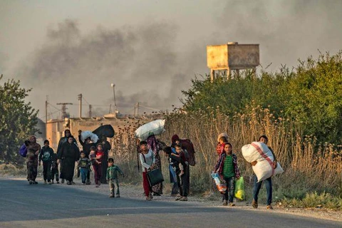 Người dân Syria rời đi lánh nạn. (Nguồn: The Globe and Mail)