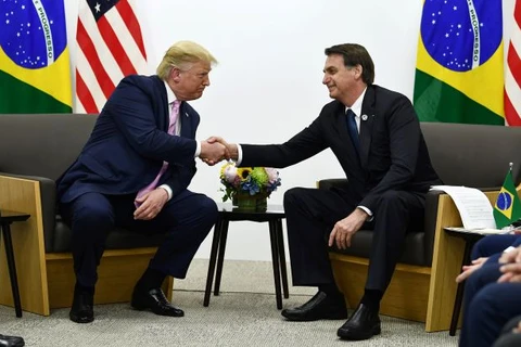 Tổng thống Brazil Jair Bolsonaro (phải) và người đồng cấp Mỹ Donald Trump. (Ảnh: NYT)