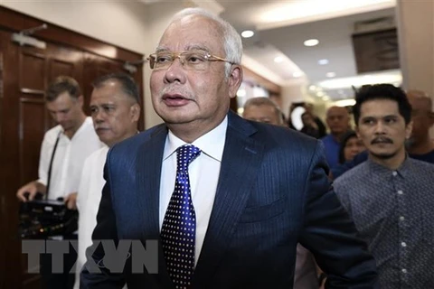 Cựu Thủ tướng Malaysia Najib Razak tới Tòa án Tối cao Kuala Lumpur. (Ảnh: AFP/TTXVN)