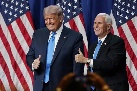 Tổng thống Donald Trump (trái) và Phó Tổng thống Mỹ Mike Pence. (Ảnh: AFP/TTXVN)