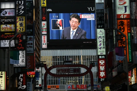 Kinh tế Nhật Bản đứng trước tương lai bấp bênh sau khi Thủ tướng Shinzo Abe từ chức. (Ảnh: Bloomberg)