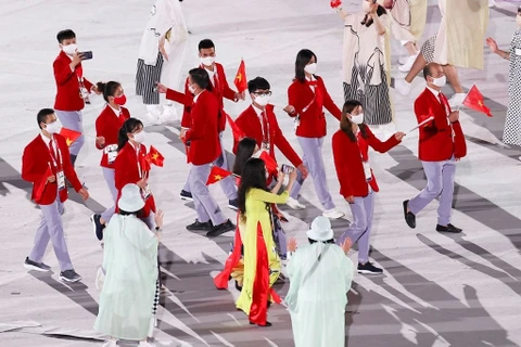 Hình ảnh Đoàn thể thao Việt Nam diễu hành ở lễ khai mạc Olympic Tokyo