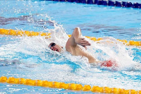 Vận động viên Huy Hoàng tiếp tục đem về huy chương vàng ở môn bơi lội đùng với kỳ vọng đặc ra trước đó. (Ảnh: TTXVN)