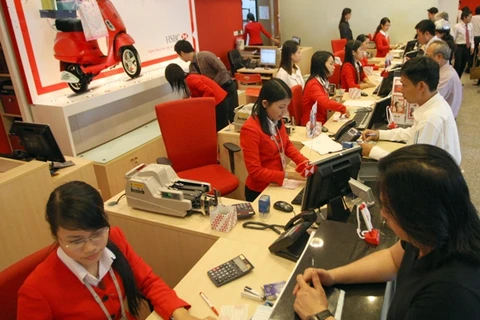 Giao dịch tại HSBC. (Nguồn: TTXVN).