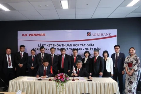 Lãnh đạo hai bên tham gia ký kết. (Nguồn: Agribank)