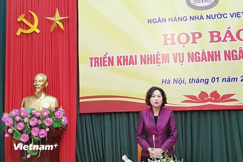 Phó Thống đốc NHNN Nguyễn Thị Hồng phát biểu tại buổi họp báo. (Ảnh: T.H/Vietnam+)
