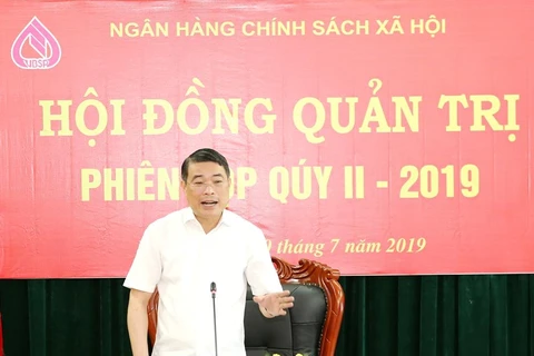Thống đốc Ngân hàng Nhà nước kiêm Chủ tịch Hội đồng quản trị Ngân hàng Chính sách xã hội Lê Minh Hưng chỉ đạo tại cuộc họp. (Nguồn: NHCSXH)