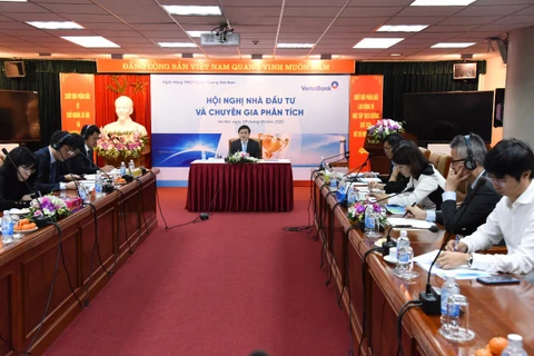 Ông Lê Đức Thọ, Chủ tịch VietinBank chia sẻ tại hội nghị. (Ảnh: CTV/Vietnam+)