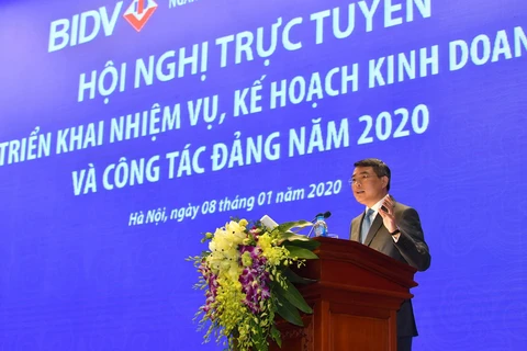 Thống đốc Ngân hàng Nhà nước Lê Minh Hưng chỉ đạo tại hội nghị. (Ảnh: CTV/Vietnam+)