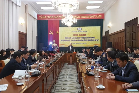 Phó Thống đốc Đào Minh Tú chủ trì hội nghị. (Ảnh: T.H/Vietnam+)