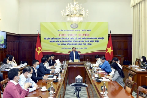 Ông Đào Minh Tú, Phó Thống đốc NHNN chỉ đạo tại hội nghị. (Ảnh: CTV/Vietnam+)