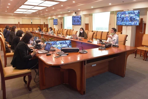 Các lãnh đạo Vietcombank tại hội nghị trực tuyến. (Ảnh: CTV)