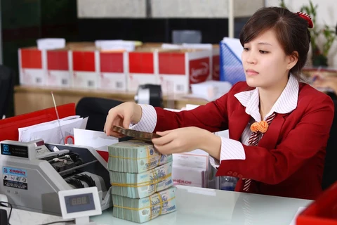 Nhiều ngân hàng lo ngại nợ xấu sẽ tăng lên do dịch COVID-19. (Ảnh: CTV/Vietnam+)