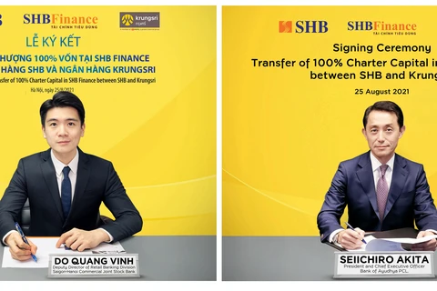 Ông Đỗ Quang Vinh-Chủ tịch HĐTV SHB Finance (tại Việt Nam) và ông Seiichiro Akita-Chủ tịch kiêm CEO Krungsri (tại Thái Lan) ký thỏa thuận chuyển nhượng 100% vốn SHB Finance. (Ảnh: CTV/Vietnam+)