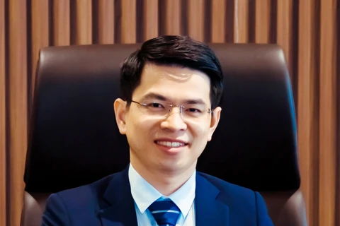 Ông Trần Ngọc Minh được bầu giữ chức danh quyền Tổng Giám đốc Kienlongbank. (Ảnh: CTV/Vietnam+)