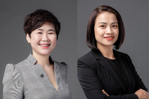 Bà Đinh Thị Tố Uyên (trái) và bà Nguyễn Thị Mỹ Hạnh (phải) được bổ nhiệm cùng lúc chức danh Phó Tổng giám đốc MSB. (Ảnh: CTV/Vietnam+) 