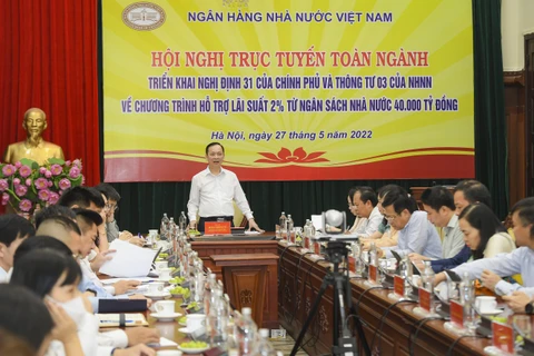 Phó Thống đốc Đào Minh Tú phát biểu chỉ đạo tại hội nghị. (Ảnh: Vietnam+)