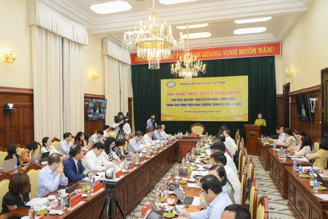 Thống đốc NHNN Nguyễn Thị Hồng phát biểu tại hội nghị. (Ảnh: Vietnam+)