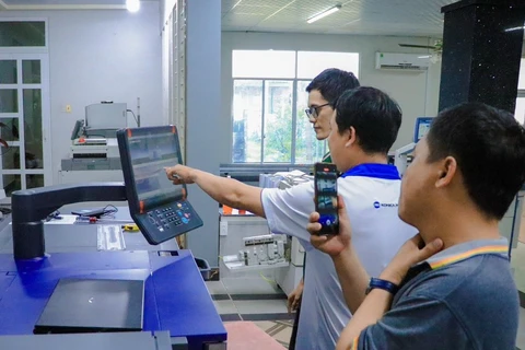 Công ty In Hưng Phú - một trong những doanh nghiệp được BIDV tài trợ vốn - áp dụng máy móc hiện đại trong hoạt động sản xuất. (Ảnh: Vietnam+)