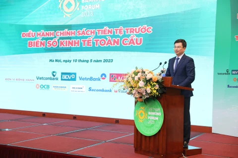 Phó Thống đốc Ngân hàng Nhà nước Phạm Thanh Hà phát biểu tại Diễn đàn. (Ảnh: Vietnam+)