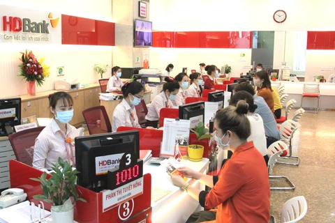 HDBank giảm lãi suất đến 2,5% hỗ trợ khách hàng cá nhân và doanh nghiệp. (Ảnh: PV/Vietnam+)