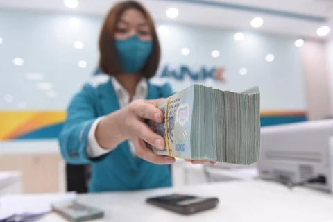 Trong 2 phiên giao dịch vừa qua, Ngân hàng Nhà nước đã hút ròng gần 20.000 tỷ đồng ra khỏi hệ thống ngân hàng thông qua kênh tín phiếu. (Ảnh: PV/Vietnam+)