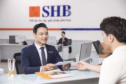 SHB giảm lãi suất nhằm giúp khách hàng kịp thời tiếp cận nguồn vốn giá rẻ để thúc đẩy doanh nghiệp vượt qua khó khăn và phát triển. (Ảnh: PV/Vietnam+)