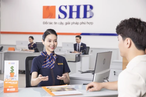 SHB tiếp tục giảm lãi suất cho vay tới 2% hỗ trợ khách hàng. (Ảnh: PV/Vietnam+)