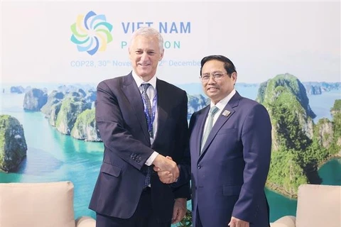 Ông Bill Winters - Tổng giám đốc Ngân hàng Standard Chartered tiếp Thủ tướng Chính phủ Phạm Minh Chính. (Ảnh: CTV/Vietnam+)