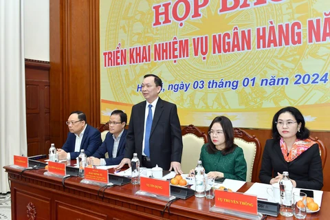 Phó Thống đốc Ngân hàng Nhà nước Đào Minh Tú phát biểu tại họp báo. (Ảnh: PV/Vietnam+)