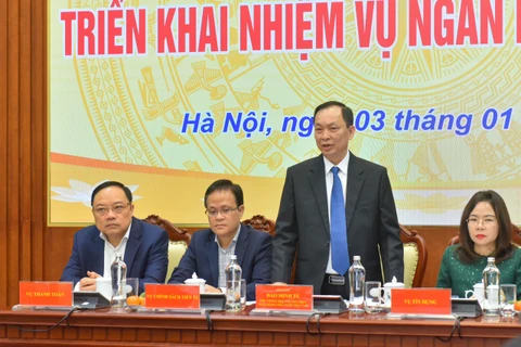 Ông Đào Minh Tú - Phó Thống đốc Ngân hàng Nhà nước phát biểu tại buổi họp báo. (Ảnh: PV/Vietnam+)