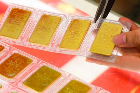 Giá vàng SJC bật tăng mạnh, tìm lại được mốc 81 triệu đồng mỗi lượng. (Ảnh: PV/Vietnam+)