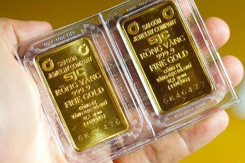 Ngân hàng Nhà nước thông báo vào sáng thứ 2 tới sẽ đấu thầu 16.800 lượng vàng miếng SJC. Giá tham chiếu đặt cọc là 81,80 triệu đồng/ lượng. (Ảnh: Vietnam+)
