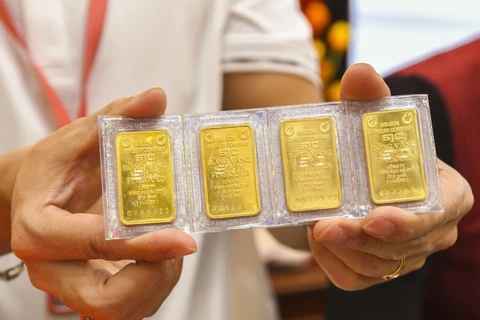 Ngày 5/6, Ngân hàng Nhà nước tiếp tục giảm giá bán vàng miếng 1 triệu đồng. (Ảnh: Vietnam+)