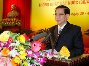Chủ tịch nước Nguyễn Minh Triết đọc diễn văn tại lễ kỷ niệm. (Ảnh: Đinh Xuân Tuân/TTXVN).