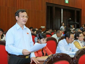 Đại biểu Quốc hội tỉnh Bình Phước phát biểu ý kiến. (Ảnh: Doãn Tấn/TTXVN)