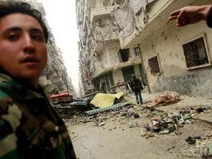 Một khu vực bị phá hủy trong cuộc giao tranh giữa lực lượng chính phủ Syria và phe đối lập. (Nguồn: AFP/TTXVN)