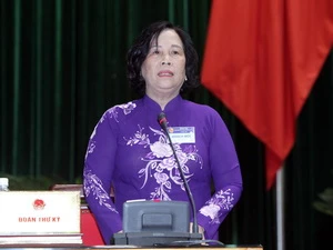 Bộ trưởng Bộ Lao động, Thương binh và Xã hội Phạm Thị Hải Chuyền trả lời chất vấn. (Ảnh: Nhan Sáng/TTXVN)